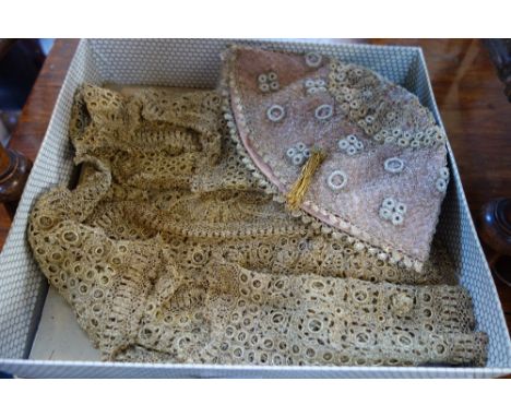 A VINTAGE KNITTED 'GOLD' WIRE WAISCOAT and a scull cap