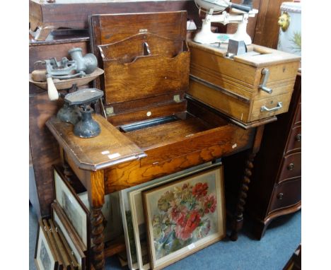 A 1920'S OAK METAMORPHIC WRITING TABLE with label "Britisher Patented Writing Table C &amp; R L" on barley twist legs