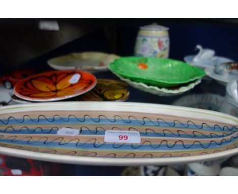 A POOLE POTTERY JAM POT and a collection of Poole Pottery and Carltonware dishes