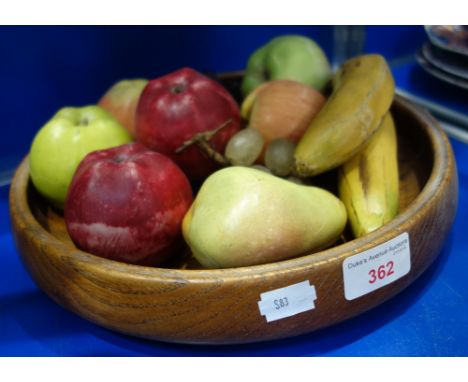 A COLLECTION OF VINTAGE WAXED FRUIT in a turned wooden bowl