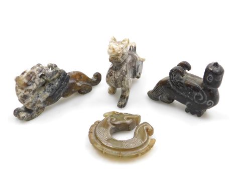 A group of Chinese jade and hardstone carvings. (4)