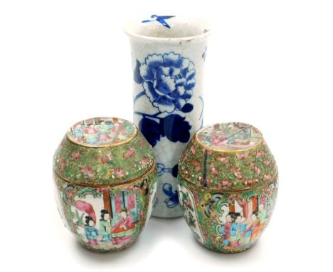 A late 19thC Qing dynasty blue and white porcelain vase, of sleeve form, decorated with birds, butterflies and flowers, four 