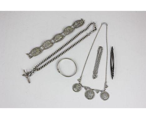 An Egyptian silver coloured metal filigree necklace and bracelet, a silver pocket watch and chain with T-bar, a marcasite bro