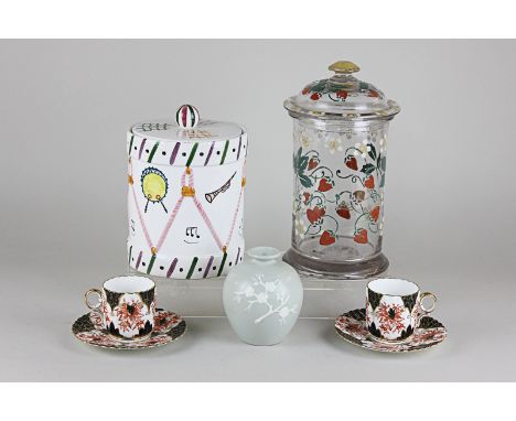 A Copeland earthenware vase decorated with cherry blossom, together with a pair of Wileman and Co coffee cups and saucers and