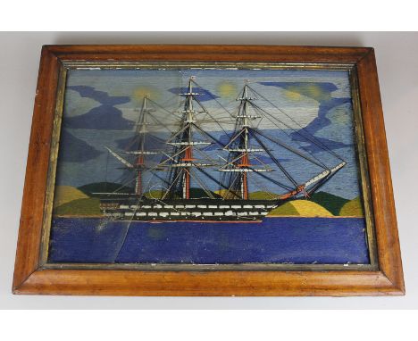 A tapestry panel depicting a three-mast ship (possibly the Victory) in maple frame