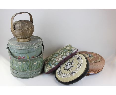 A painted circular sewing box, a tapestry covered footstool, two tapestry covered cushions and another woven sewing box