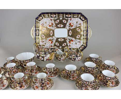 A Royal Crown Derby Imari pattern tea and coffee set comprising a tray, teapot, milk jug, sugar bowl, slop bowl, six teacups 