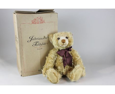 A Steiff Teddy bear 2000, in blond 43 colour way with growler, in original box with certificate