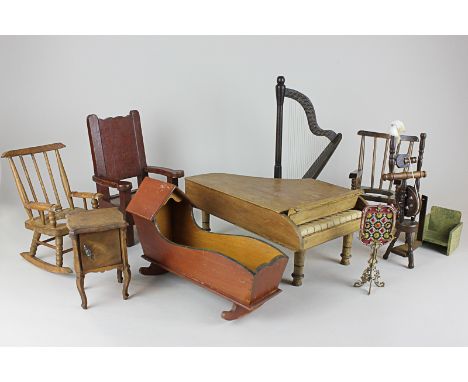 A doll's wooden grand piano, 32cm, a harp, four various chairs, crib, cabinet (a/f), spinning wheel and gilt metal fire scree