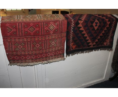 A Kilim rug in blue, black and red geometric pattern, 61cm by 66cm, together with another with two-tone stripes, 49cm by 74cm