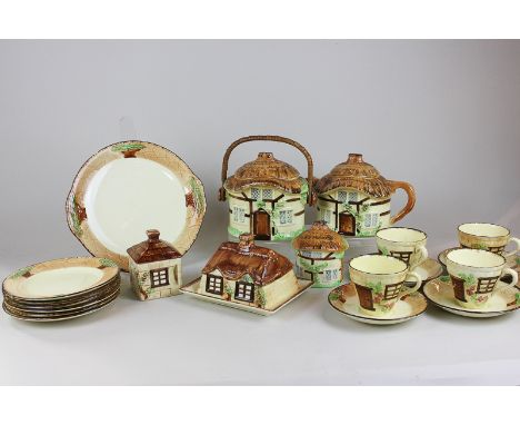 A Burlington ware Devon cob part tea service for six, to include teapot, biscuit barrel, butter dish, sugar bowl, etc