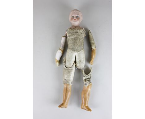 An English bisque porcelain bisque head and shoulder doll with painted features, leather body and detached limbs, without clo