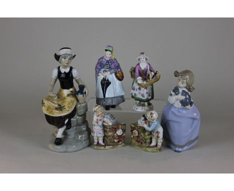 Six various porcelain figurines including a Nao girl with puppy, a Spanish Gama girl seated on rocks, a pair of children next