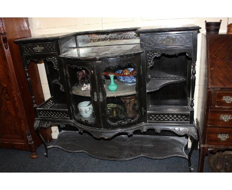 A Victorian ebonised sideboard with glazed bow front centre and open side shelves, on cabriole legs, with under-shelf,138cm, 