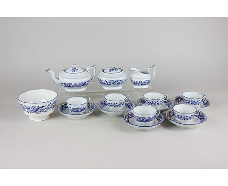 A 19th century blue and white miniature tea set for six including teapot, milk jug, sugar bowl and slop bowl