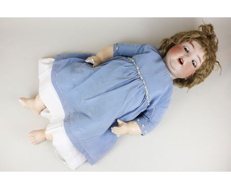 A Henbach Germany bisque porcelain head doll with brown hair, brown sleeping eyes and open mouth, composite limbs, number 342