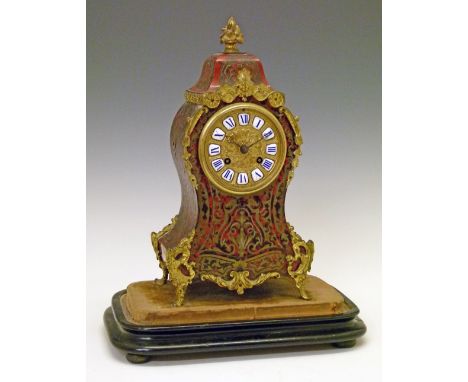 19th Century French boulle cased mantel clock, having cast ormolu mounts, gilt dial having blue and white enamel chapter ring