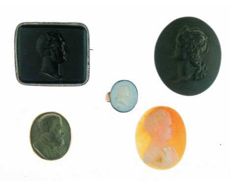 Glass paste portrait medallion signed Henderson, now mounted as a ring, 2.25cm high, a carved shell cameo depicting a portrai