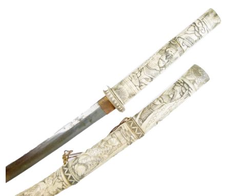 Japanese sword, the hilt and scabbard of carved bone decorated with deities, warriors and other figures, curved single edge b