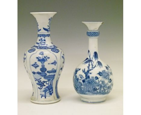 Two Chinese porcelain vases, each having painted blue and white foliate decoration in the Kangxi manner, 24.5cm and 27.5cm hi