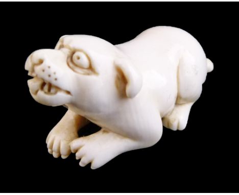 19th Century Japanese carved ivory netsuke formed as a recumbent dog, bears signature Masayuki, 4.5cm long  Condition: **No o