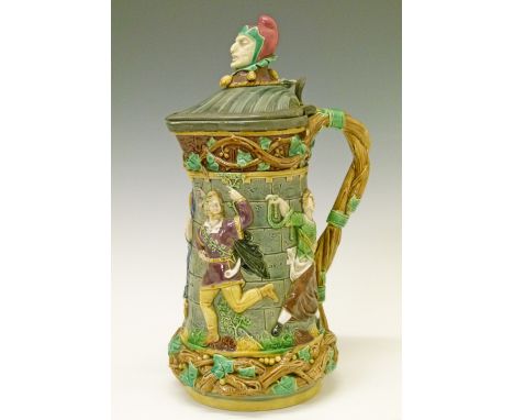19th Century Minton majolica lidded Tower jug, the pewter mounted hinged cover having a finial formed as the head of Mr Punch