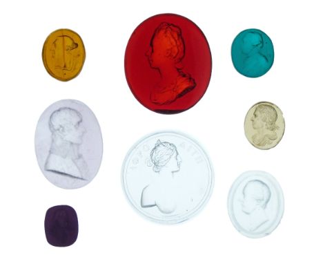 Carved lilac glass oval portrait intaglio depicting Napoleon Bonaparte, signed Harris, 4.5cm high, a clear carved glass oval 