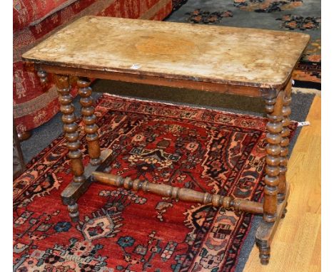 A Victorian window table, with inlaid foliate panel to the top, raised on turned and bobbin supports, 68cm high x 82cm wide x