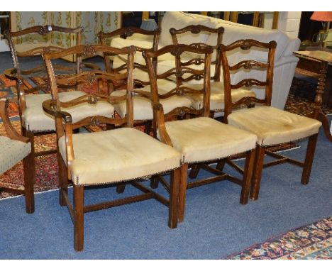 A set of six George III style mahogany ladder back chairs, including two carvers, with cream upholstered seats with stud deco