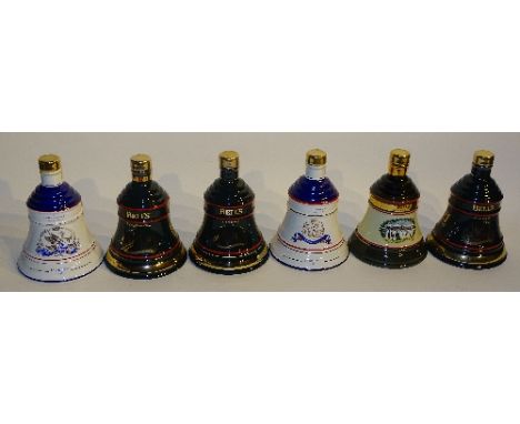 A group of commemorative Bell's Wade porcelain Scotch whisky decanters, unopened, to include 1990 Birth of Princess Eugenie, 