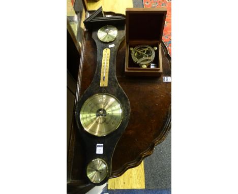 A modern portable brass sundial compass by West London, in hardwood case, together with a Tempest barometer, 73cm long (2)