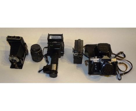 A quantity of vintage cameras, lenses and equipment, to include Zenit EM Helios 44, Pathe Scope 'H', Pentax Super and ME Supe