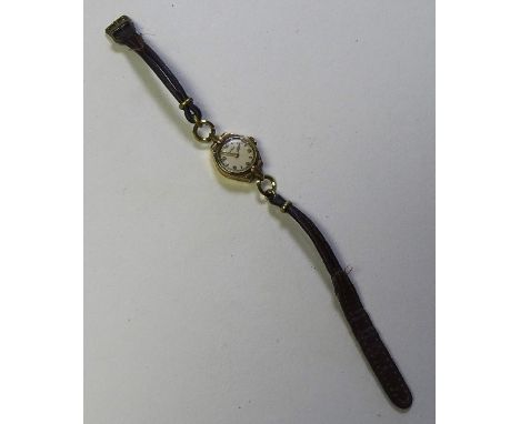 A 9ct gold Rotary lady's cocktail watch, stamped 375 to case, on thin brown leather strap, in box
