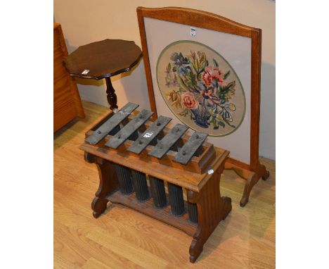 An oak framed dinner gong, 41cm high x 52cm wide, together with a mahogany wine table and an oak framed firescreen with embro