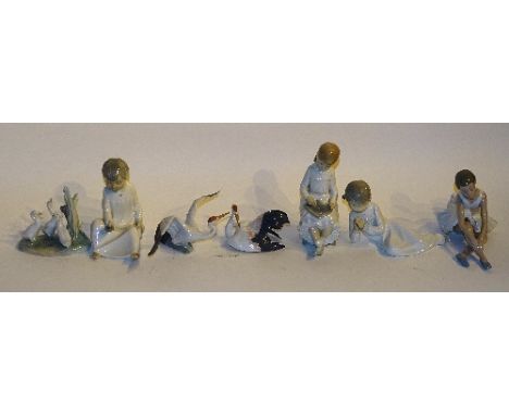 Seven Lladro and Nao porcelain figures, to include two Lladro figures of swans, Nao ballerina etc (7)