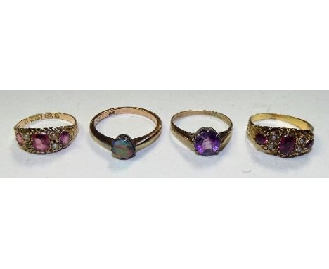 A 9ct gold opal ring, stamped 9ct to underside, ring size P, 2g, together with a 9ct gold amethyst ring, stamped 9ct, ring si