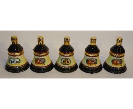A group of commemorative Christmas Extra Special Bell's Wade porcelain Scotch whisky decanters, unopened, to include three Ch