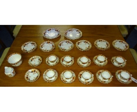A vintage china tea set, decorated with floral panels on white ground, stamped SCH England to base (36)
