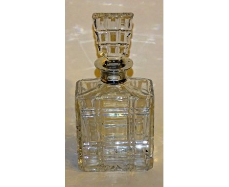 An oblong square crystal decanter with silver collar, hallmarks for London 1967 Mappin & Webb, 25cm high