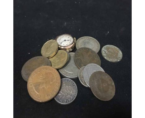 LADY'S EARLY 20TH CENTURY MANUAL WIND WRIST WATCH lacking strap; along with various international coins