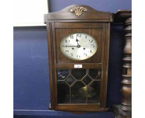 EDWARDIAN WALL CLOCK with silvered dial, in a mahogany case
