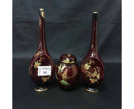 TWO CARLTON WARE VASEStogether with three Carlton Ware ginger jars and covers