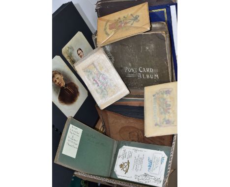 NINE ALBUMS OF POSTCARDS, containing approximately 490 early 20th century examples featuring photographic portraiture, rural 