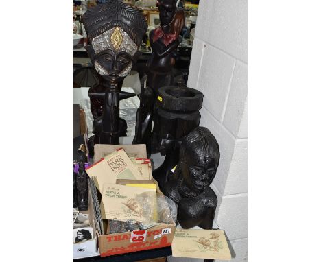 A GROUP OF SIX LARGE WOODEN AFRICAN CARVINGS AND A BOX OF EPHEMERA comprising a large female bust, height 35cm x width 35cm, 