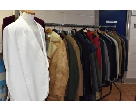 A LARGE QUANTITY OF GENTLEMEN'S VINTAGE CLOTHING, to include a cream coloured Boss single breasted suit, a pair of white leat
