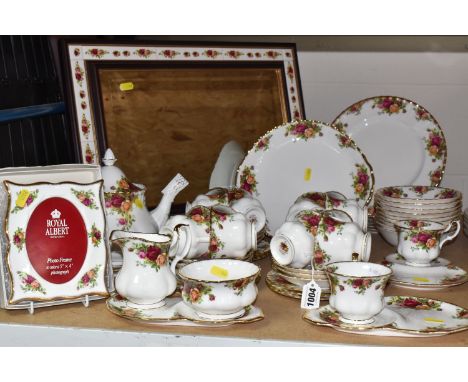 A GROUP OF ROYAL ALBERT 'OLD COUNTRY ROSES' DINNER AND TEAWARE, comprising six dinner plates, one cake plate, nine dessert bo