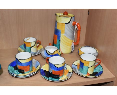A SUSIE COOPER FOR GRAYS POTTERY 'CUBIST STYLE' PATTERNED COFFEE SERVICE comprising a coffee pot, a milk jug (chip to the spo
