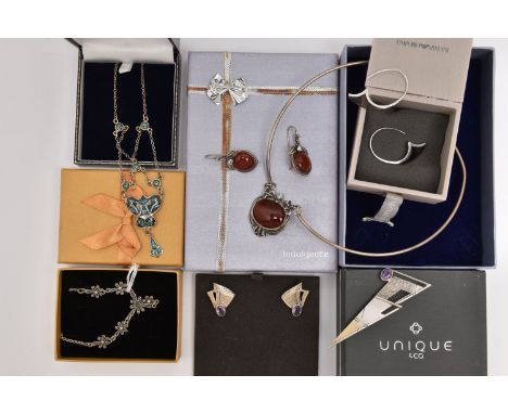 A SELECTION OF SILVER AND WHITE METAL JEWELLERY, to include a boxed silver abstract brooch set with amethyst together with ma