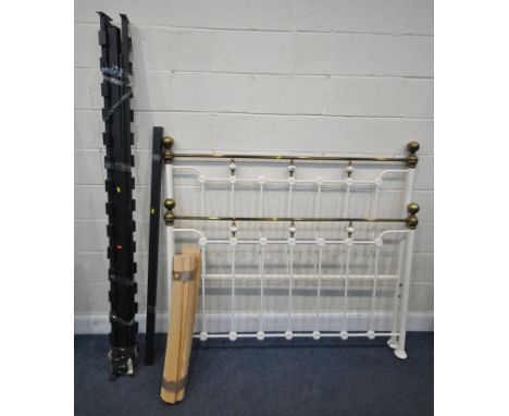 A WHITE PAINTED TUBULAR METAL 4FT6 BEDSTEAD, with side rails, slats, and bolts, condition report: general signs of wear and u