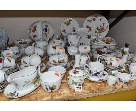 A LARGE QUANTITY OF ROYAL WORCESTER 'EVESHAM' PATTERN TABLEWARE, comprising two covered tureens, oval casserole dish, two lar